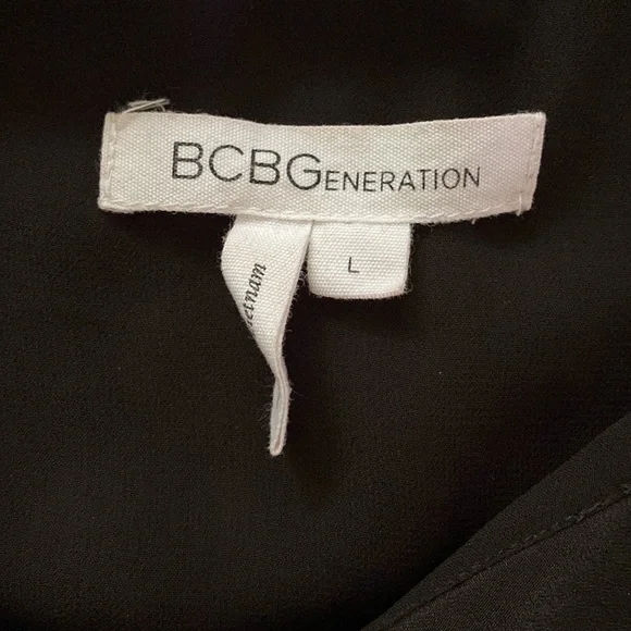 BCBGeneration Black Ruffle Sleeveless Romper - Picture 2 of 7